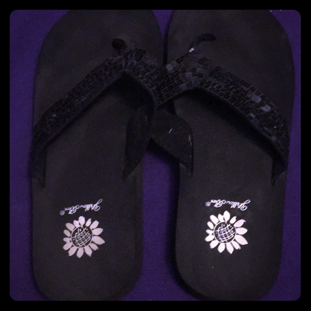 Yellow box flip flops